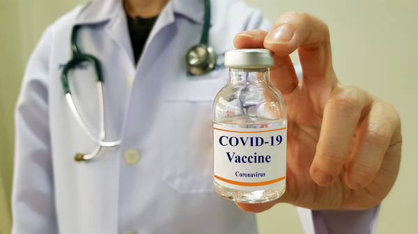 Doctor show COVID 19 vaccine for prevention and treatment new corona virus infection(COVID-19,novel coronavirus disease 2019 or nCoV 2019